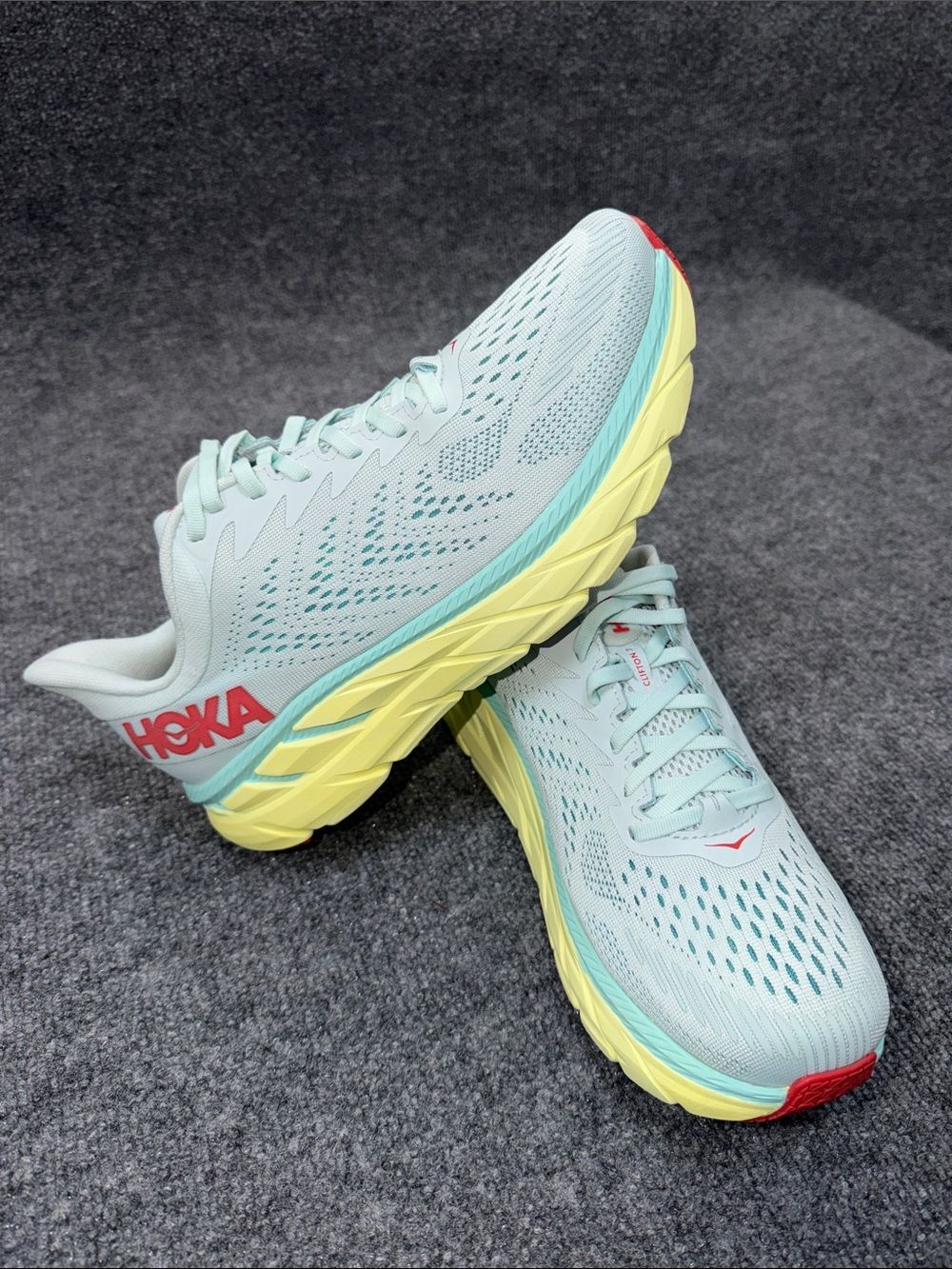 Hoka Clifton 7 running shoes in the Morning Mist and Hot Coral colorway size 10D